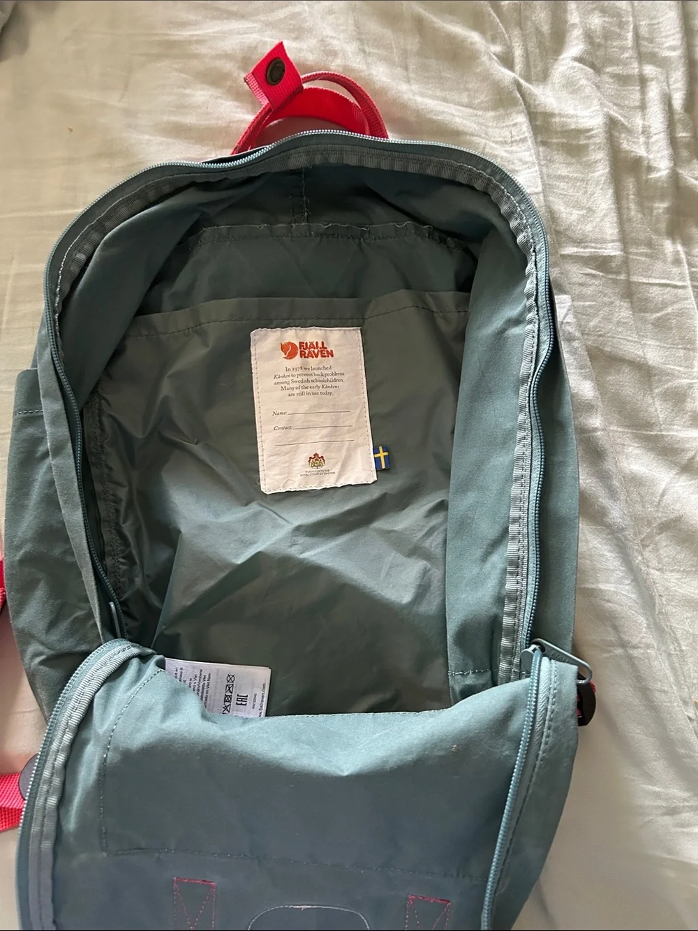 Fjallraven Kånken Backpack in Teal with Pink Accents